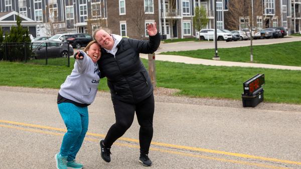 Two runners having fun at end of the race